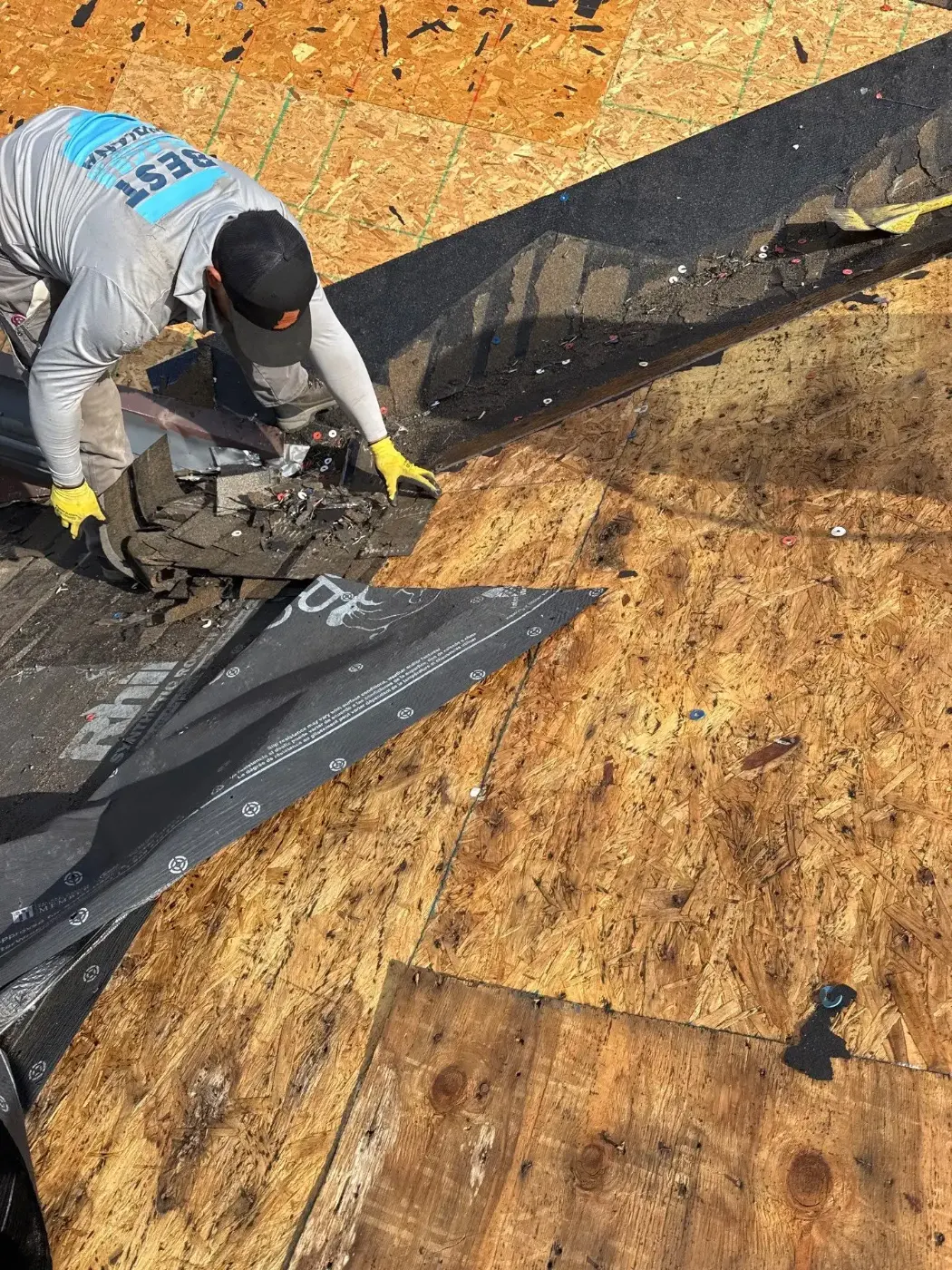 Tarping and dry-in on a Crooked Creek commercial roof